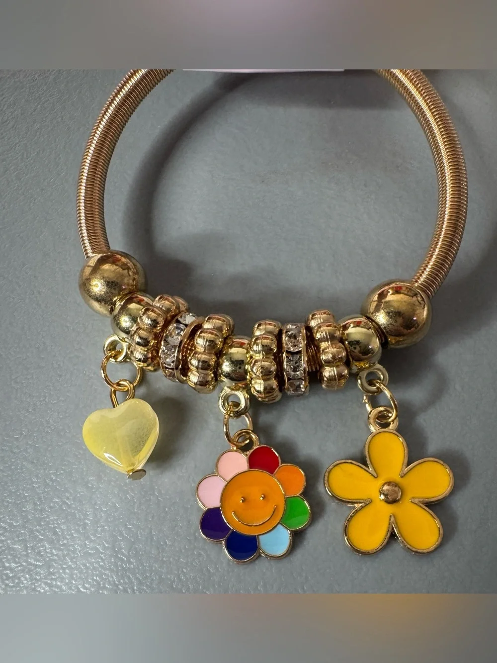 Girls Gold Charm Bracelet with Yellow Flower & Multicolor Smiley Charms stretch